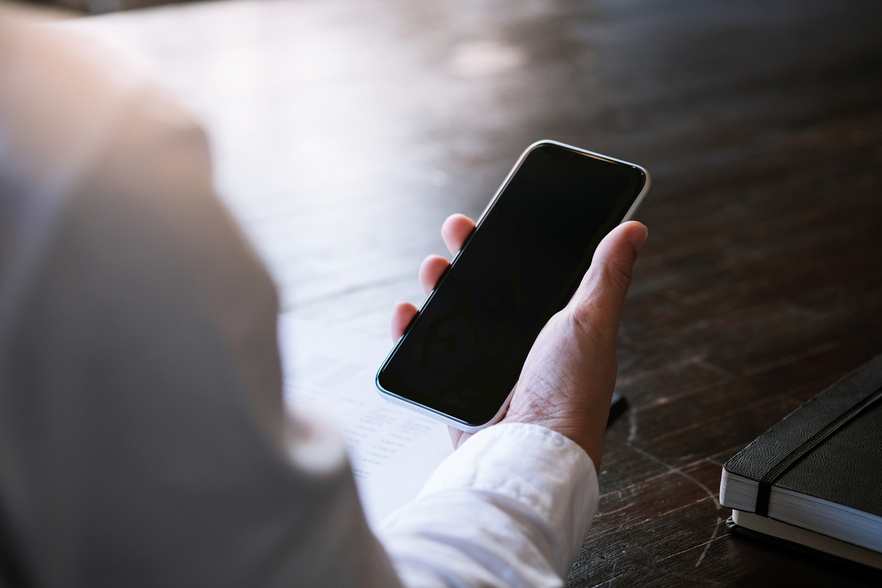 Business Man Hand Hold Smart Phone. Technology Concept